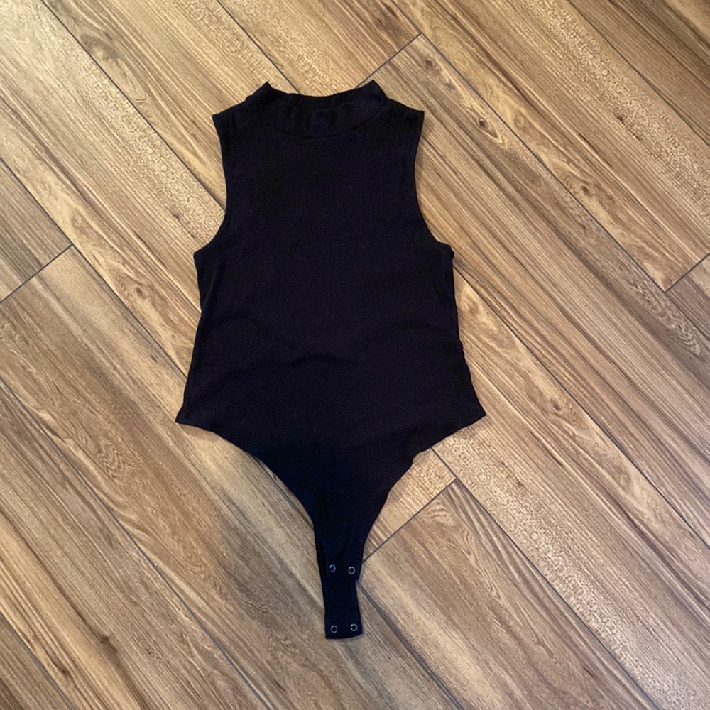 Banana Republic black mock neck bodysuit, size medium, never worn